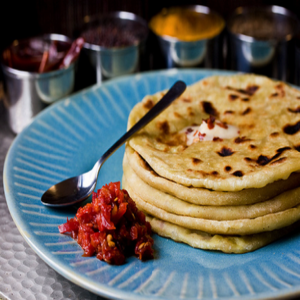 Ri – Paneer Paratha With Curd